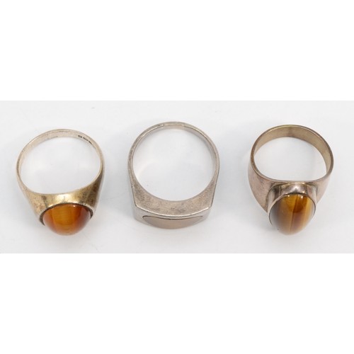 218 - Three silver rings set with tigers eye, size P-Q, T-U, S, 24gm.