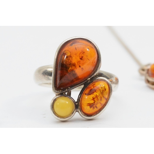 237 - A group of Baltic amber silver jewellery to include an abstract ring, size L, 25gm.