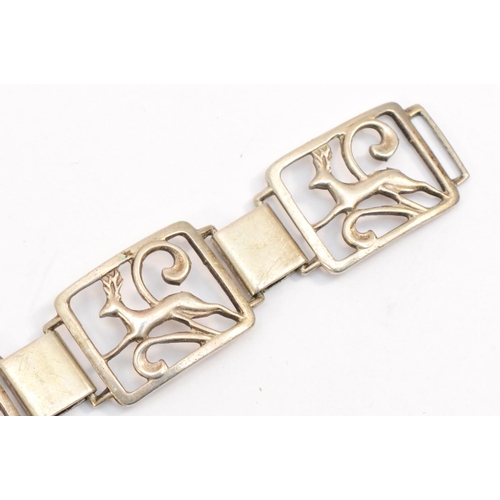 253 - C. Brumberg Hanson, a .830 silver paneled bracelet with deer, length 19cm, 21gm.