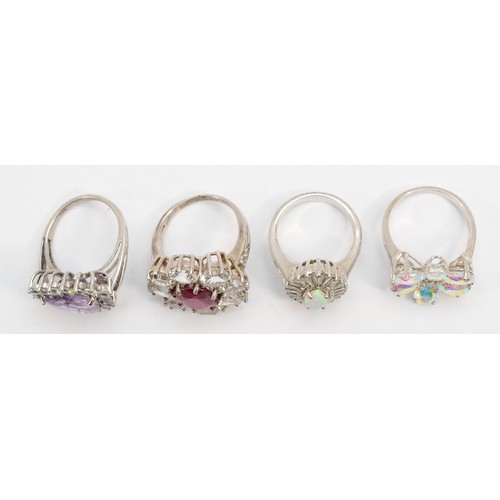 270 - Four silver gemset cocktail rings, sizes O, L, N-O, 23gm.