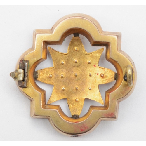 305 - A Victorian seed pearl framed starburst brooch, 2.5cm, 3.5g, lacking pin.