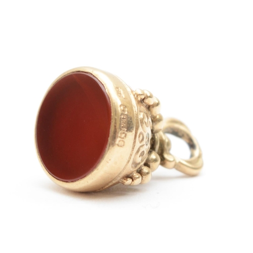 313 - A 9ct gold Carnelian fob pendant, 1.5cm,  3.3gm.