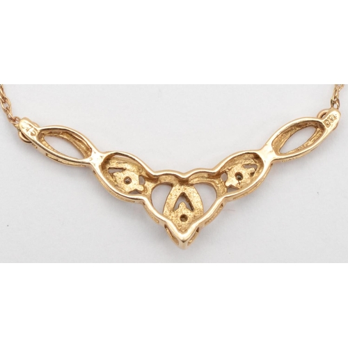 317 - A 375 gold openwork diamond necklace, 44cm, 2.1gm.