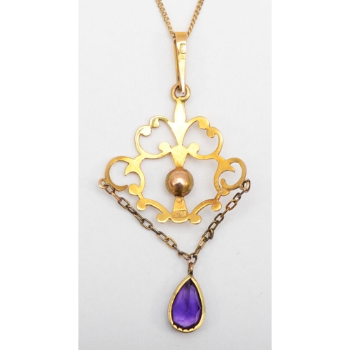 318 - An Edwardian 9ct gold openwork pendant with amethyst drop on chain, 45cm, 2.6gm.