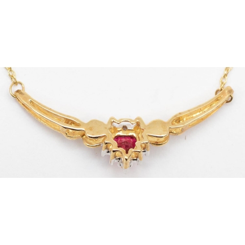 322 - A 9ct gold diamond and heart cut synthetic ruby necklace, 42cm, 2.4gm.