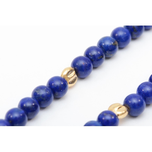 325 - A 5mm lapis lazuli bead necklace with 9k gold clasp, 41cm, 21.8gm.