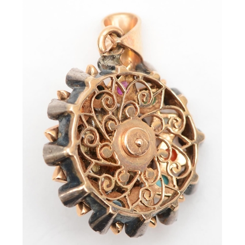 330 - An Indian gold mounted and silver set multi gem set starburst pendant, 2.5cm,9.6gm.