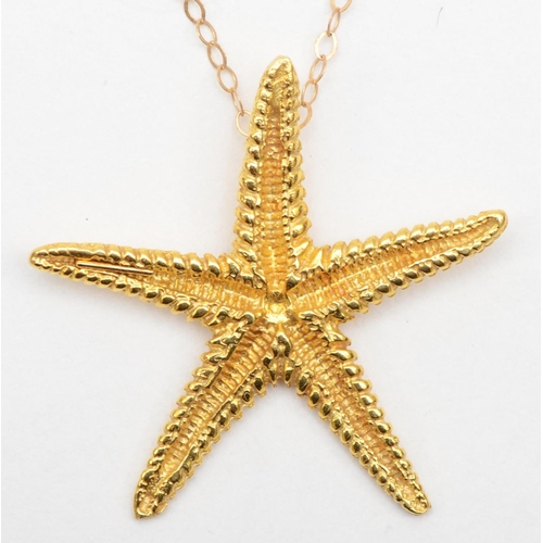 370 - A vintage 585 gold starfish pendant, 28mm, on 9k fine link chain, 40cm, 2.5gm.