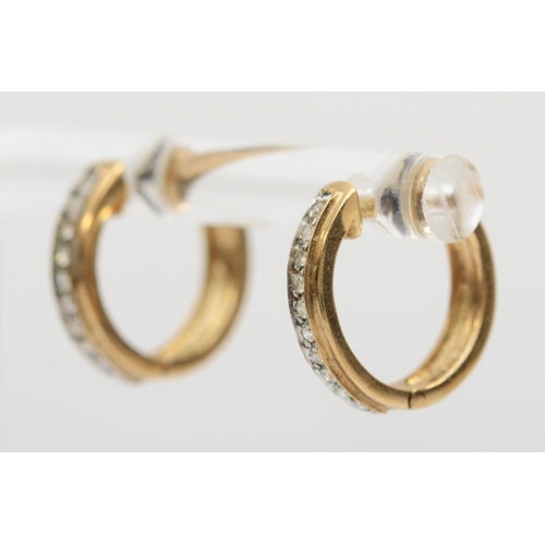 381 - A 9ct gold pair of diamond hoop earrings, 1.5cm , 2.1gm.