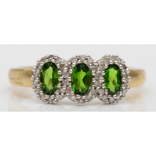 514 - A 9ct gold three diopside and diamond cluster ring, T, 2.7gm