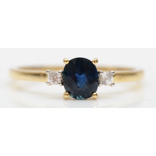 515 - A 9ct gold synthetic sapphire and white gemstone ring, N 1/2, 1.4gm