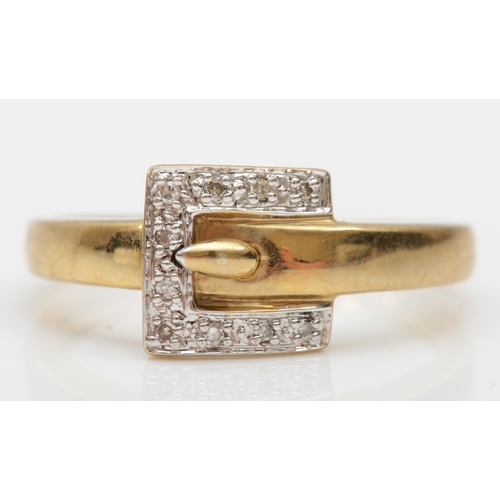 518 - A 9ct gold and diamond buckle ring, Q, 2.2gm