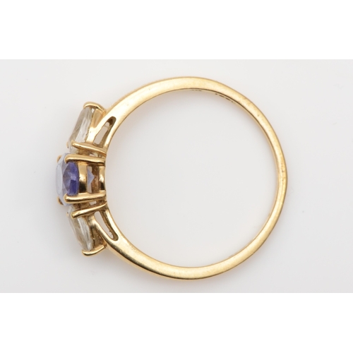 520 - A 9ct gold tanzanite and white gemstone three stone ring, N 1/2, 1.8gm