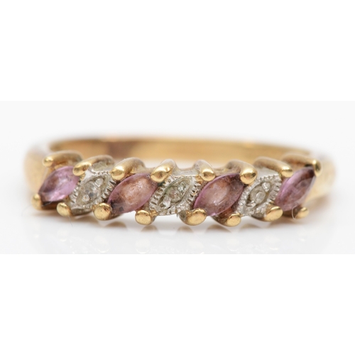 524 - A 9ct gold pink sapphire and diamond ring, N, 2.5gm