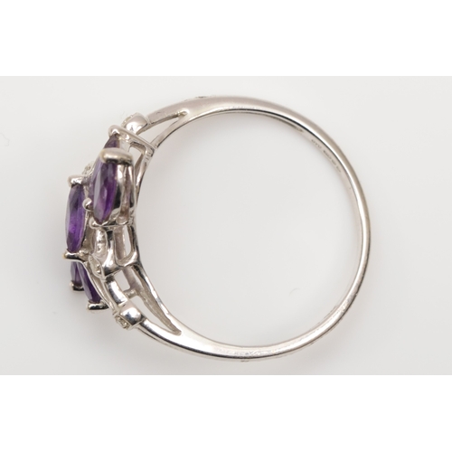 526 - A 9ct white gold, amethyst and diamond dress ring, T, 2.7gm