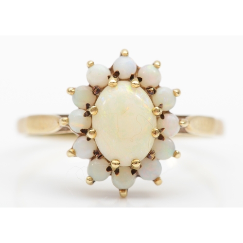 533 - A 9ct gold and opal cluster ring, S, 2.3gm