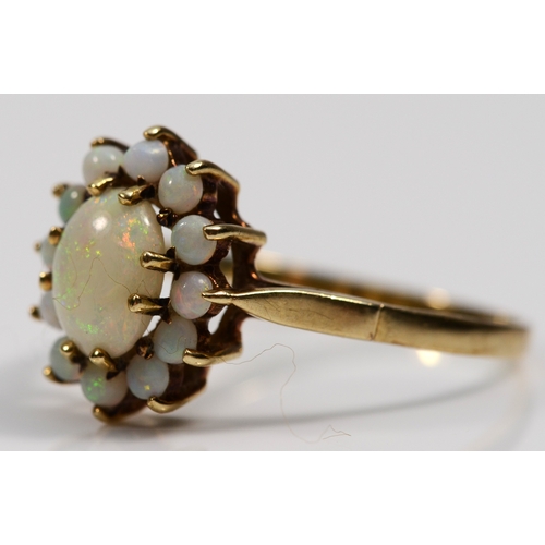 533 - A 9ct gold and opal cluster ring, S, 2.3gm