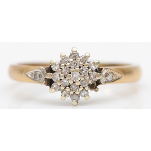 535 - A 9ct gold and diamond cluster ring, stated weight 0.15cts, L, 2gm