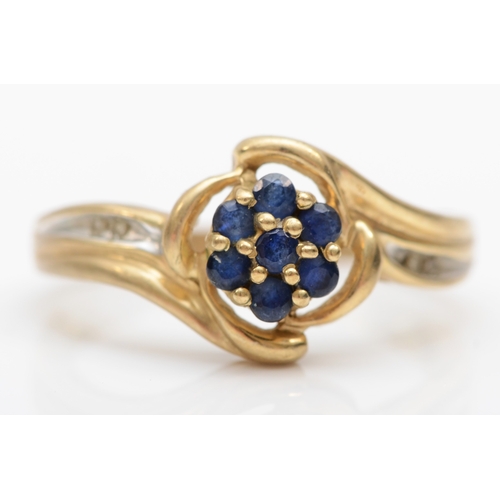 544 - A 9ct gold and sapphire cluster ring, N, 2.5gm.