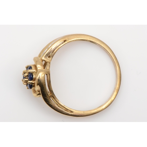 544 - A 9ct gold and sapphire cluster ring, N, 2.5gm.