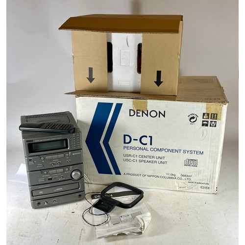 A Denon micro Hi-Fi system, with speakers, model D-C1 boxed