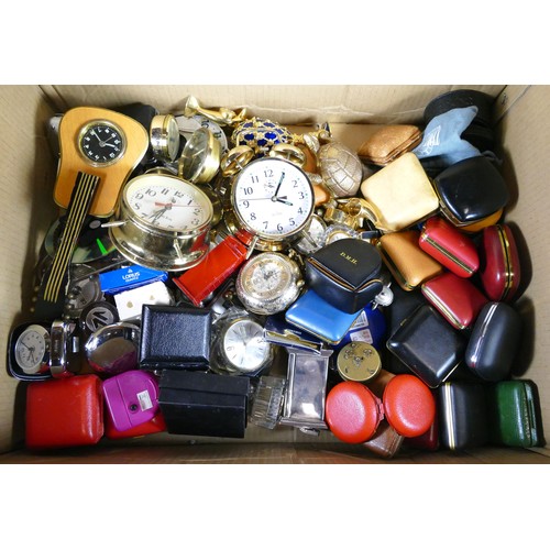 A collection of miniature novelty clocks, together with traveling alarm ...