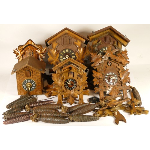A collection of six mid 20th century and later cuckoo clocks, for spares or repair.