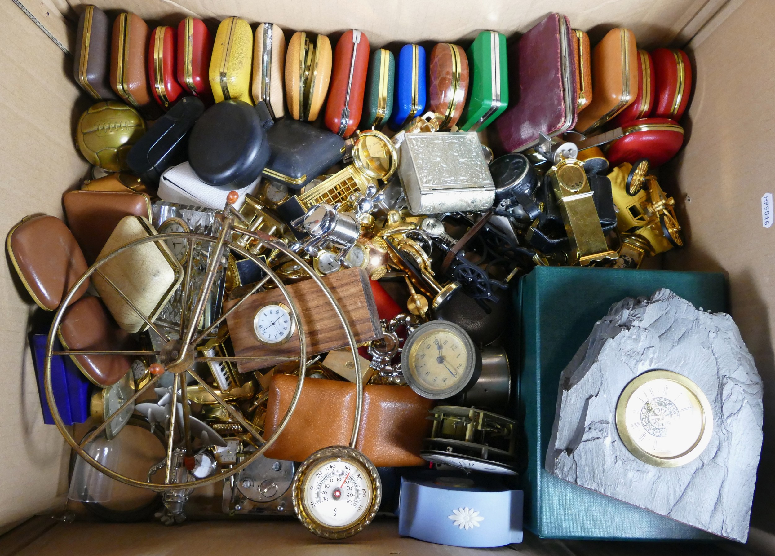 A collection of miniature novelty clocks, together with a quantity of ...