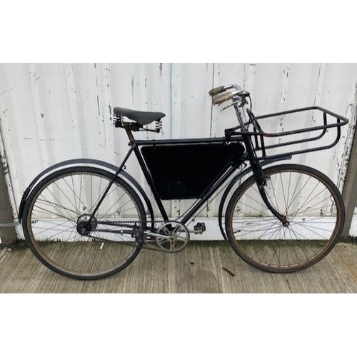 91 - A Mid 20th century 'Butchers' delivery bicycle, painted black with 3 speed gears.