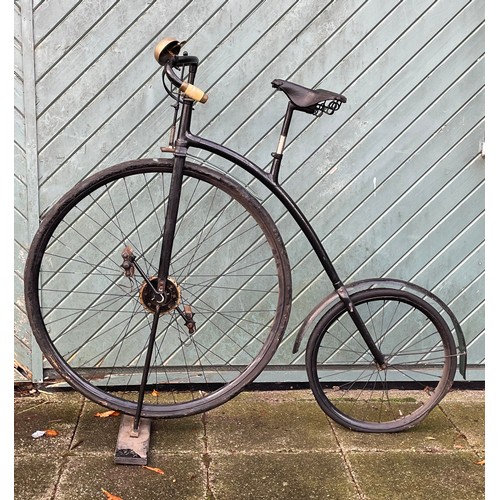 95 - An early 20th century black enamelled Penny Farthing, front wheel 33