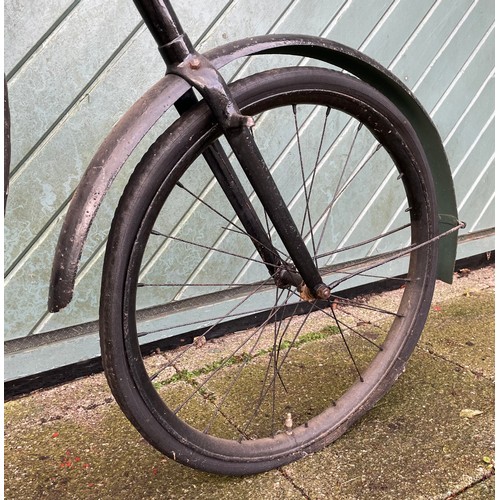 95 - An early 20th century black enamelled Penny Farthing, front wheel 33