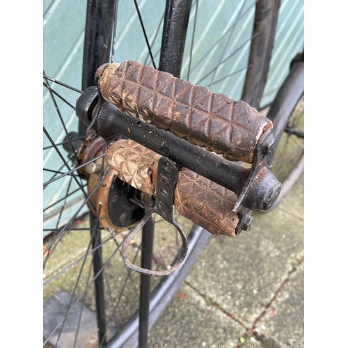 95 - An early 20th century black enamelled Penny Farthing, front wheel 33