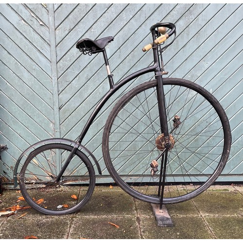 95 - An early 20th century black enamelled Penny Farthing, front wheel 33