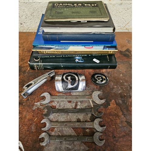 100 - Four vintage Daimler spanners, and other Daimler related badges and books