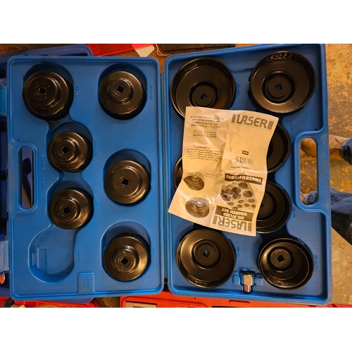 110 - A 15 piece cup oil filter wrench set, a radio removal kit and other tools, mainly unused