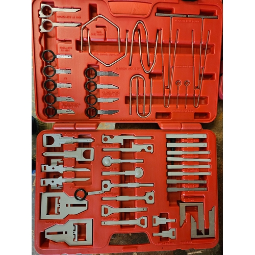 110 - A 15 piece cup oil filter wrench set, a radio removal kit and other tools, mainly unused