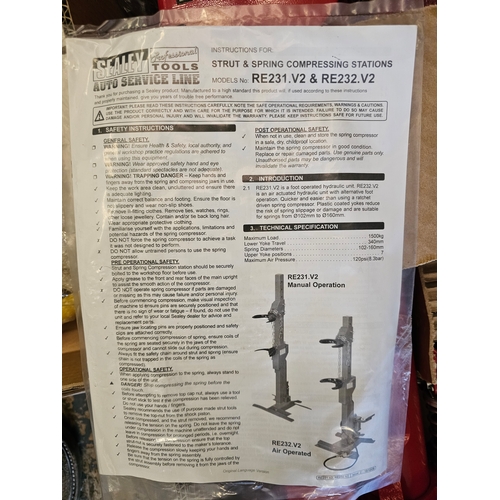 116 - A Sealy strut and spring compressor station and a Sealey coil spring compressor system, both unused