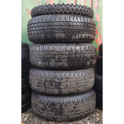 137 - A set of four Toyota Hilux wheels with Bridgestone tyres, size (265-65R17), with a motorcycle tyre. ... 