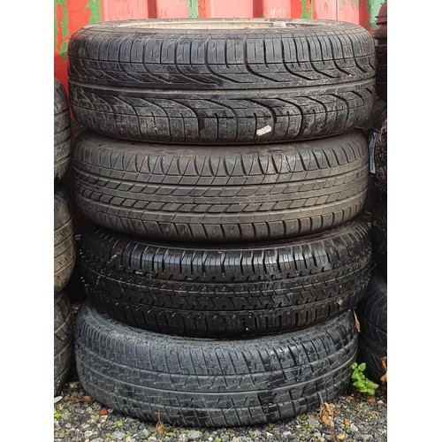 140 - A set of four Pirelli tyres, size 185-60R14. (4)