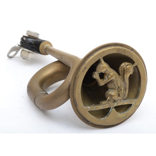 209 - A brass motorcycle horn with squirrel motif, 17cm.