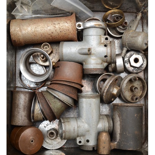 222 - A quantity of vintage carburetor parts.