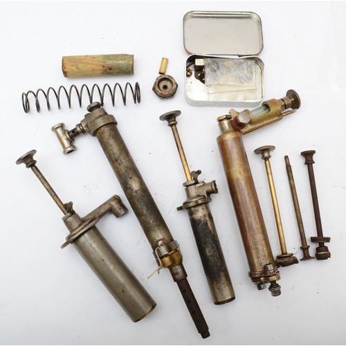 224 - Four vintage oil pumps (in parts).