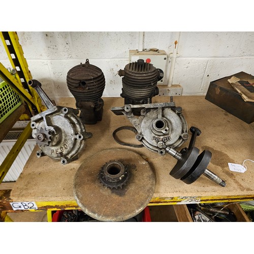 242 - Two Peco engines dismantled, No 65614 and No A10 76521, two crank shafts, one fly wheel, three barre... 