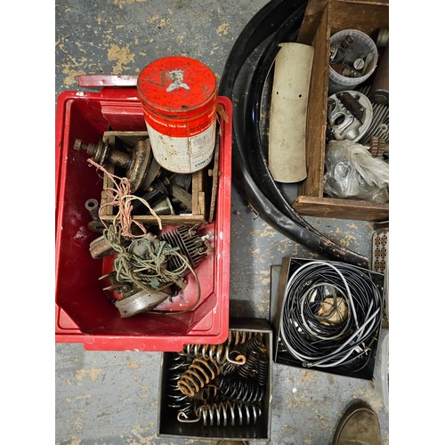 245 - A quantity of British motorcycle parts and spares.