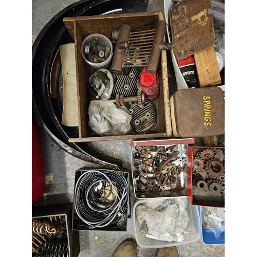 245 - A quantity of British motorcycle parts and spares.