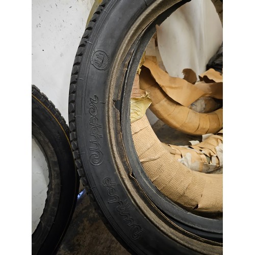 246 - Four Michelin veteran bead edge tyres, 650/65, a pair of Dunlop Clipper 26 - 2 1/4 tyres, and a pair... 