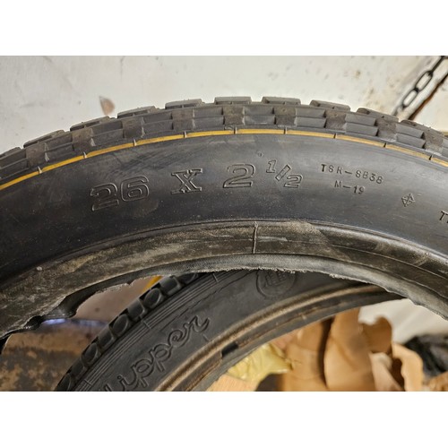 246 - Four Michelin veteran bead edge tyres, 650/65, a pair of Dunlop Clipper 26 - 2 1/4 tyres, and a pair... 