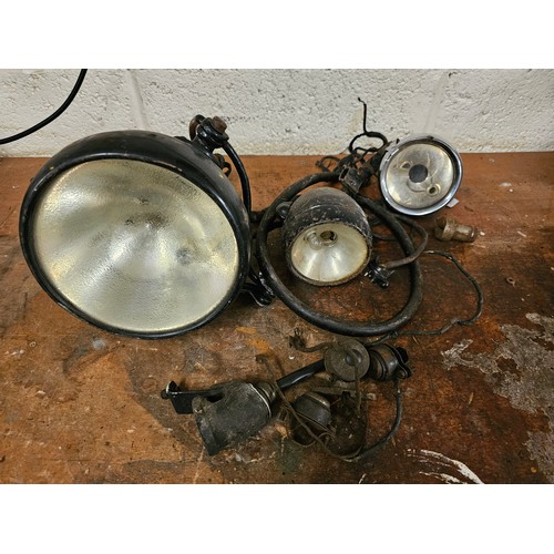 252 - A vintage Lucas King of the Road head light with built in amperes meter, two side lights and three h... 