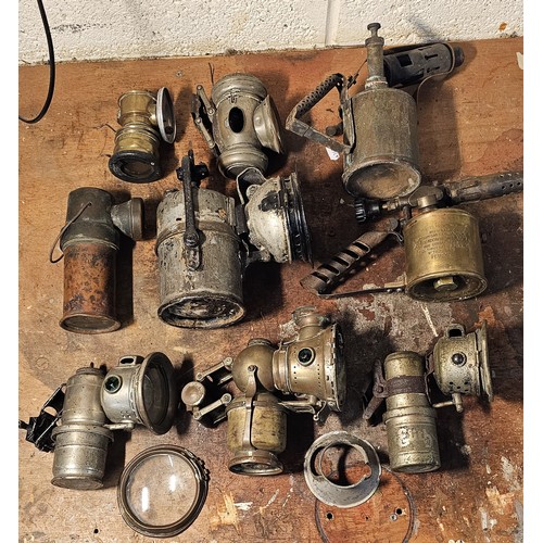 267 - A collection of bicycle acetylene lamps and blow torches.