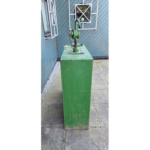 69 - A Castrol green oil dispenser, 92 x 92 x 31cm